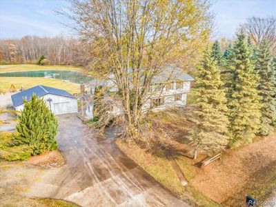 6154 Ravenswood Road, Home with 5 bedrooms, 3 bathrooms and null parking in Kimball Twp MI | Image 3