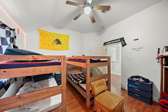 These secondary rooms are ideal for multi-functional use, whether you're setting up a home gym or creating a quiet study space. Ceiling fans and ample wall space add both comfort and flexibility. | Image 26