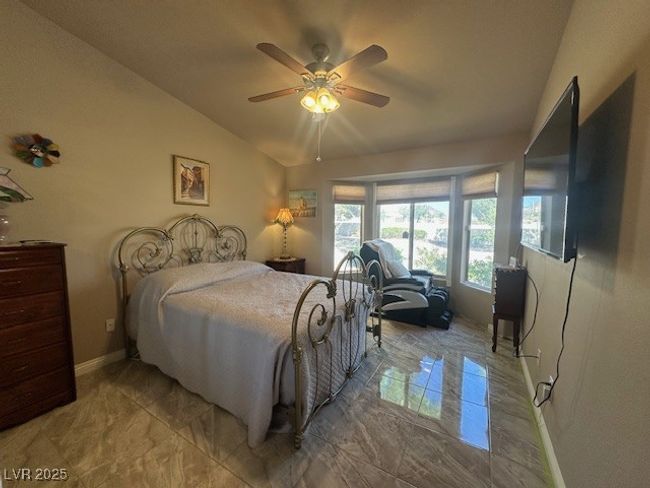 Bedroom with vaulted ceiling and ceiling fan | Image 9