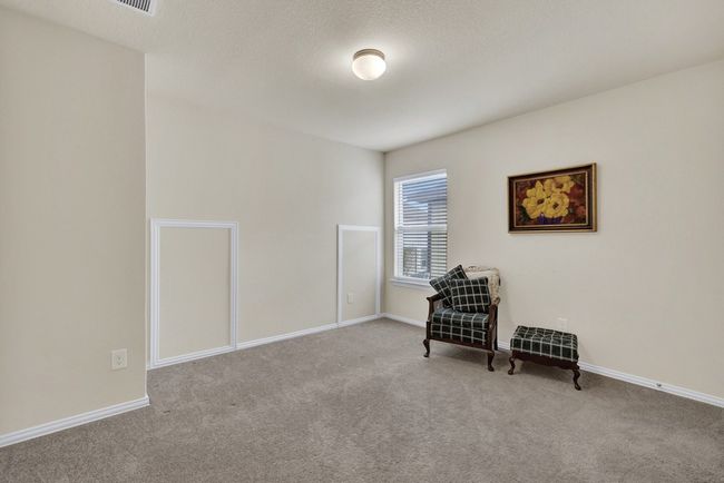 Living area with baseboards and carpet flooring | Image 30