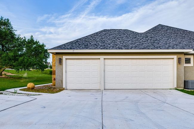 Oversized 3 car garage attached to property | Image 8