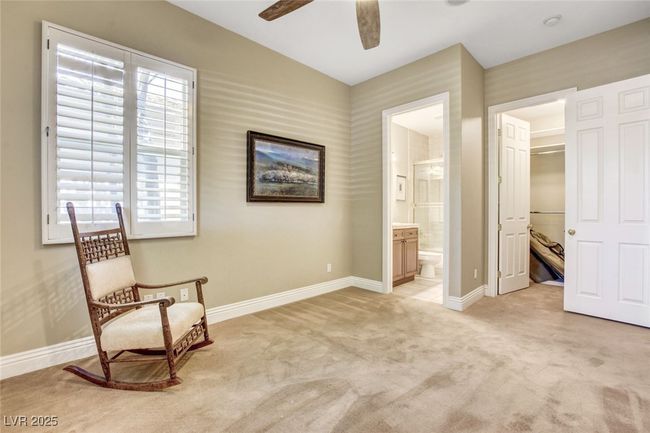 Unfurnished room featuring baseboards, light carpet, and a ceiling fan | Image 40