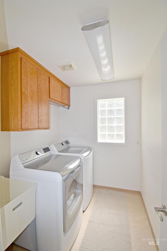 Laundry area with washer and dryer and cabinet space | Image 16