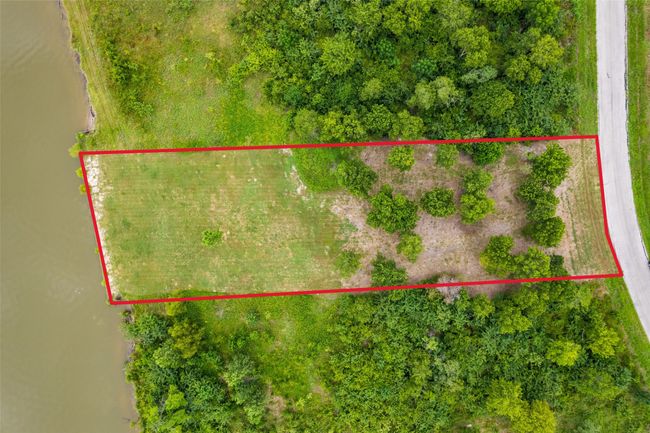 Aerial overview of property's location featuring property parcel outlined | Image 4