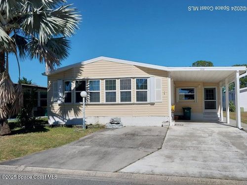 306 Papaya Cir, Barefoot Bay, FL, 32976-6851 | Card Image