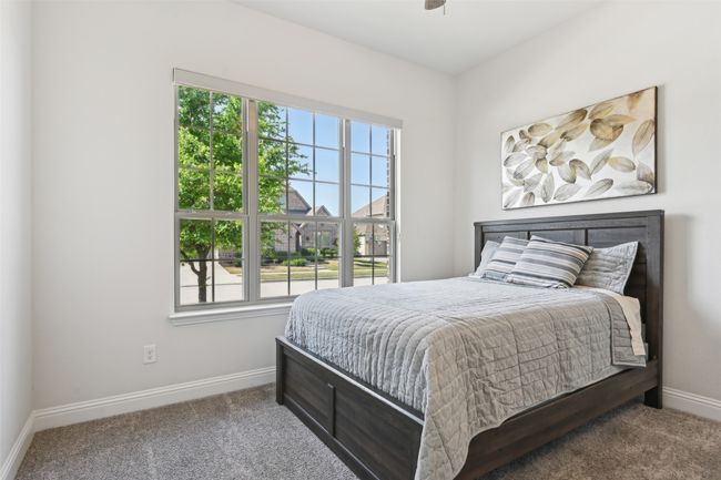 Bedroom with baseboards and carpet floors | Image 35