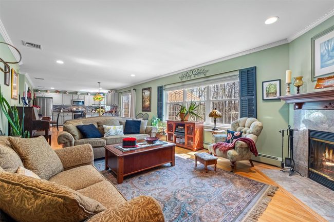 Family room open to the eat-in kitchen. | Image 8