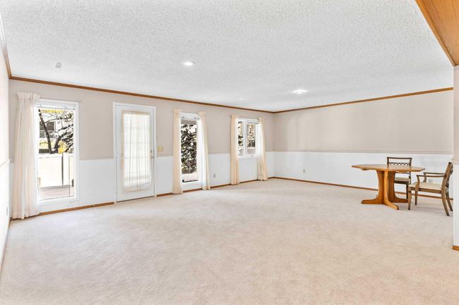 1038 Shawnee Rd Sw, Home with 3 bedrooms, 3 bathrooms and 4 parking in Calgary AB | Image 29