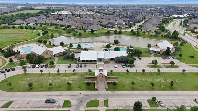 Aerial perspective of suburban area featuring a large body of water | Image 25