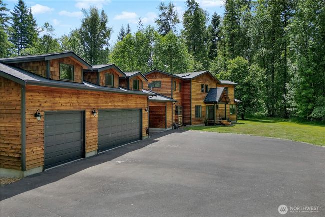 Detached 3-car garage and plenty of paved parking. | Image 30