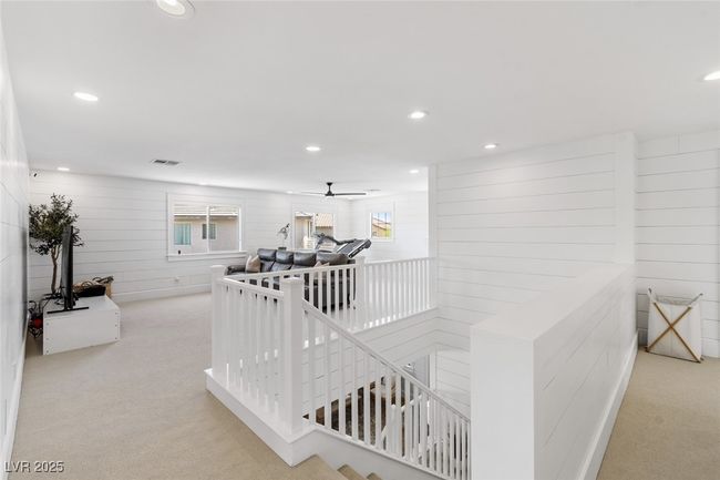 Corridor with recessed lighting, carpet flooring, and an upstairs landing | Image 35