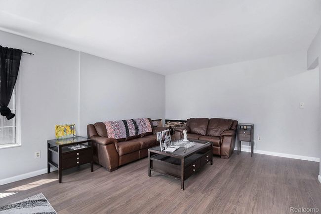 Living area featuring wood finished floors | Image 5