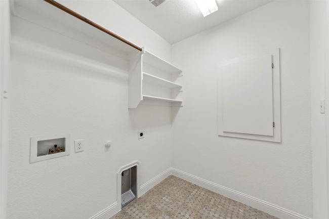 Clothes washing area featuring washer hookup, hookup for an electric dryer, laundry area, hookup for a gas dryer, and baseboards | Image 38
