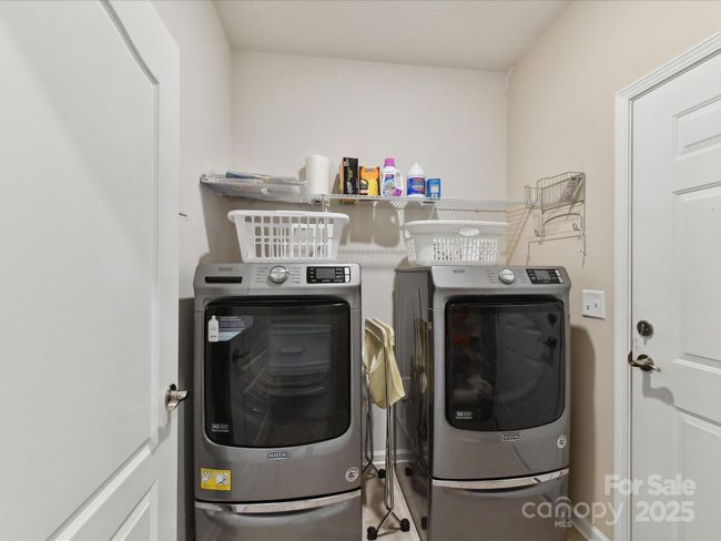 Separate Laundry Room with Tiled Floors | Image 26