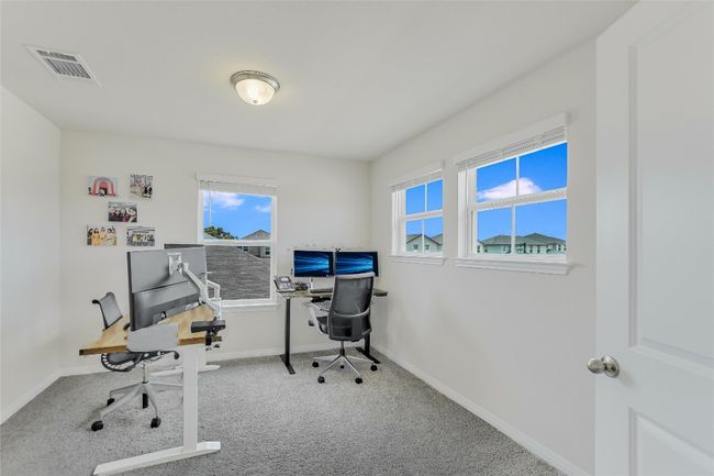 Carpeted home office with baseboards | Image 15