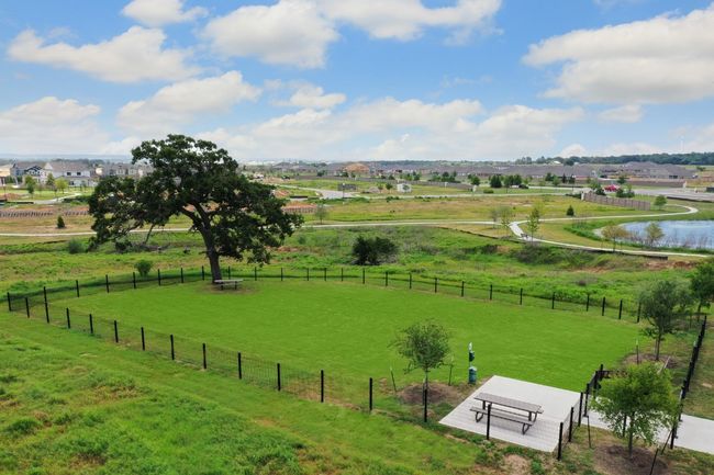 Clean dog park located in the neighborhood | Image 6