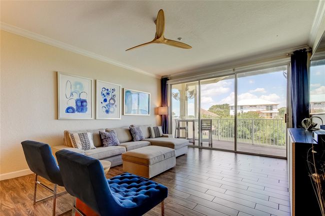 Living Room space with Large Waterfront View Balcony | Image 9