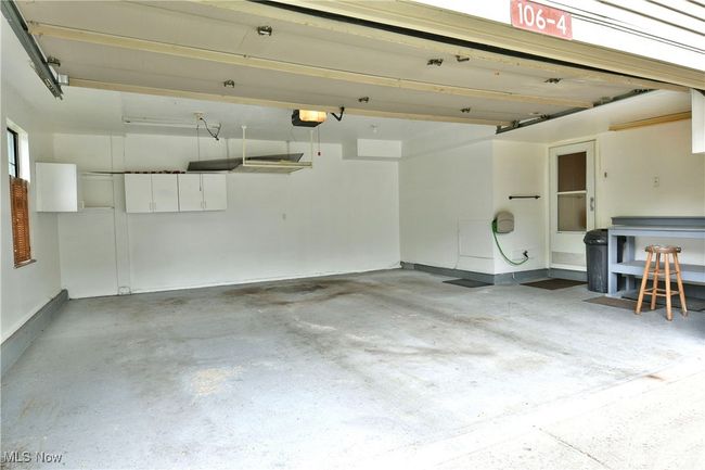 Garage featuring a garage door opener | Image 46