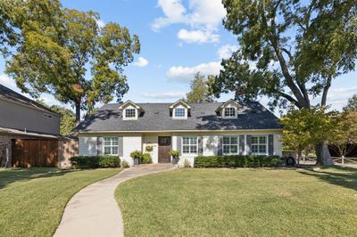 Cape cod home with a front lawn | Image 1