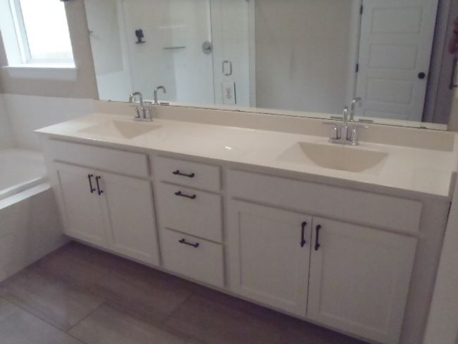 Full bathroom with double vanity, a garden tub, tile patterned flooring, and an enclosed shower | Image 25