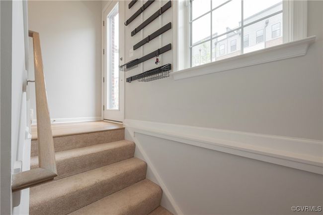 Stairway leading to basement-featuring baseboards | Image 24