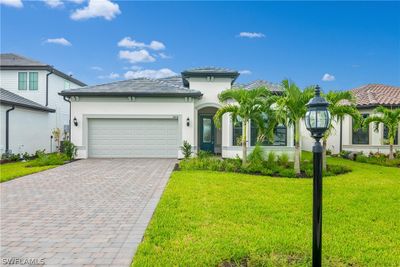 20414 Pebble Glen Drive, House other with 3 bedrooms, 2 bathrooms and null parking in Estero FL | Image 1