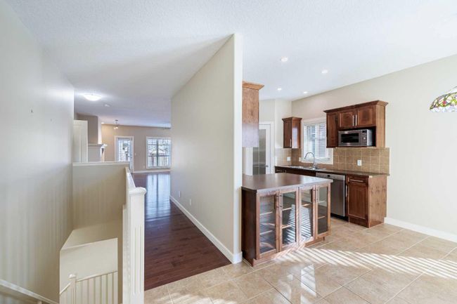 24 Bridle Estates Place Sw, Home with 3 bedrooms, 2 bathrooms and 7 parking in Calgary AB | Image 8