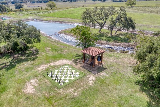 Drone / aerial view with a water view and a rural view | Image 23