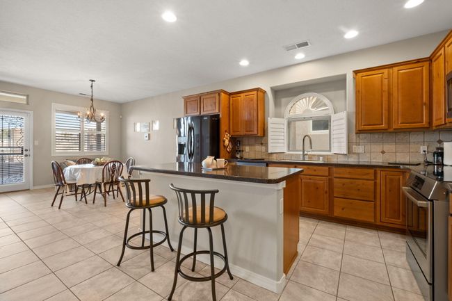 8719 Desert Fox Way, Condo with 3 bedrooms, 3 bathrooms and null parking in Albuquerque NM | Image 5