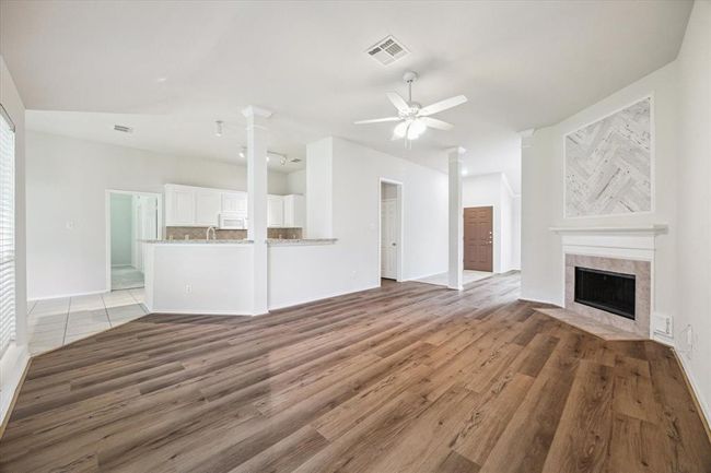 Living area looking into kitchen | Image 7