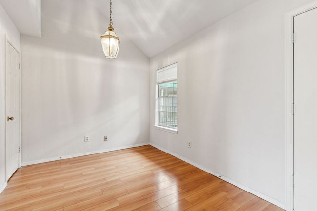 Vaulted ceilings, wood flooring, additional closet space | Image 24