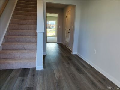 Stairs featuring light hardwood flooring | Image 3