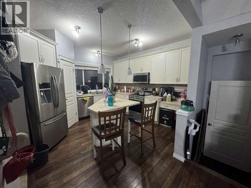 2105 New Brighton Gdns Se, Calgary, AB, T2Z0B6 | Card Image