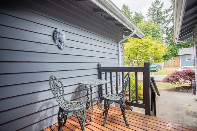 Nice seating area on front deck | Image 24