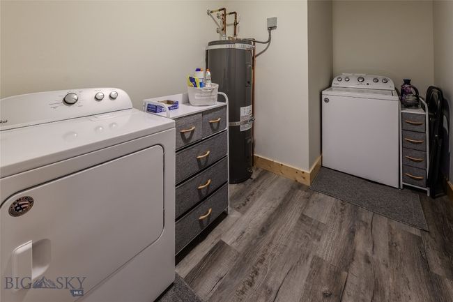 Separate laundry room with washer and dryer in each unit. | Image 10