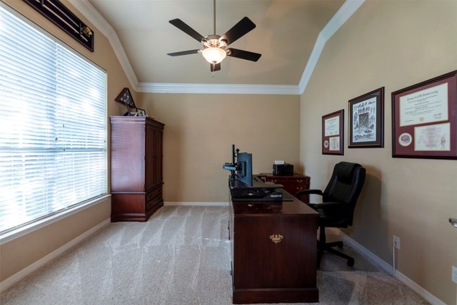 Office area featuring crown molding, light colored carpet, and a ceiling fan | Image 23