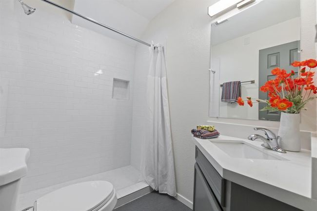 First floor bathroom with newly remodeled walk in shower | Image 10