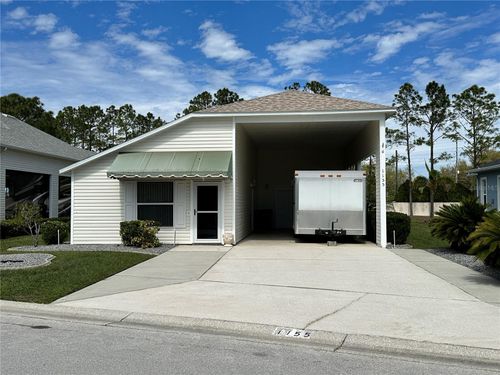 1155 Motorcoach Dr, POLK CITY, FL, 33868-9115 | Card Image