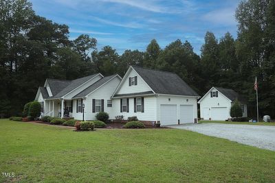 FRONT VIEW OF HOUSE WITH GARAGES SHOWING | Image 2