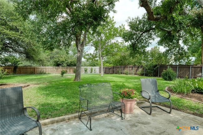 Look at this stunning and massive backyard. Notice the double gates on the back right which allows access to park an RV or trailer in the far back of the yard out of the way. | Image 29