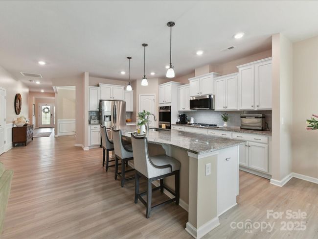 Subway Tiled Backsplash, Walk in Pantry and Recessed Lighting | Image 12