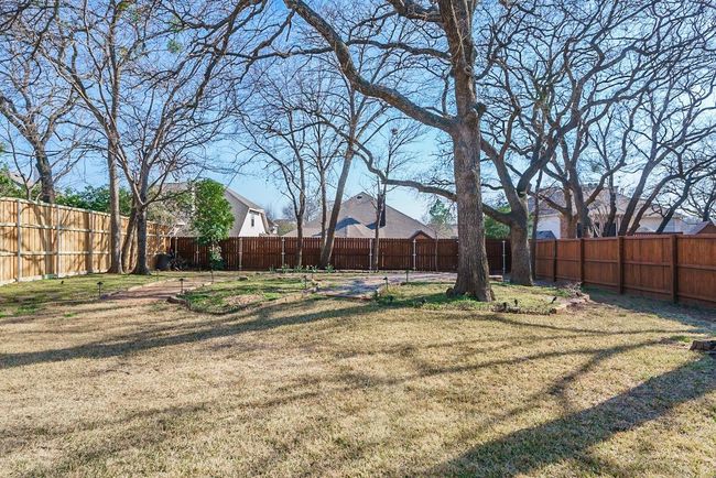 View of yard featuring a fenced backyard | Image 25