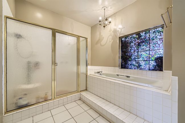 . . . large garden tub, oversized shower and second closet. | Image 23