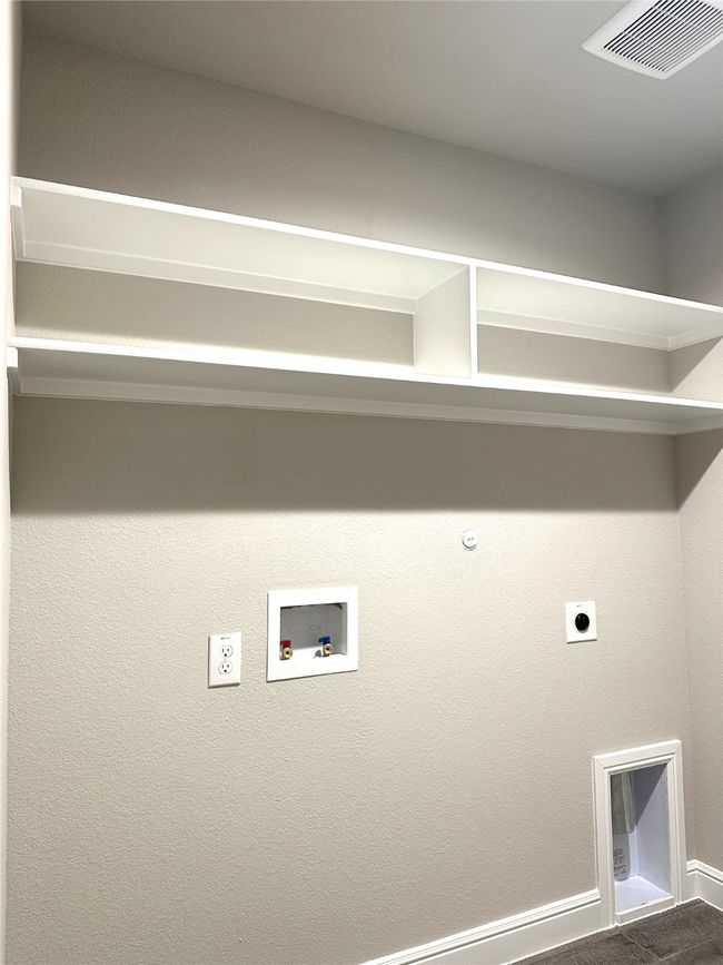 Laundry room with hookup for a gas dryer, electric dryer hookup, and washer hookup | Image 17