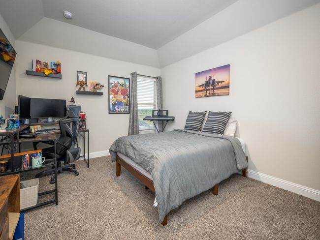Fourth bedroom features a spacious closet and versatile layout! | Image 15
