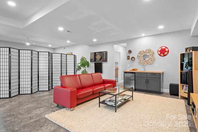 Lower level/basement finished space with tons of options for entertainment, gym, office space etc. | Image 24