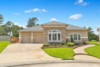 Gorgeous custom 1-story home boasts 3 spacious bedrooms, 2.5 baths, a home office, and a flex room | Image 1