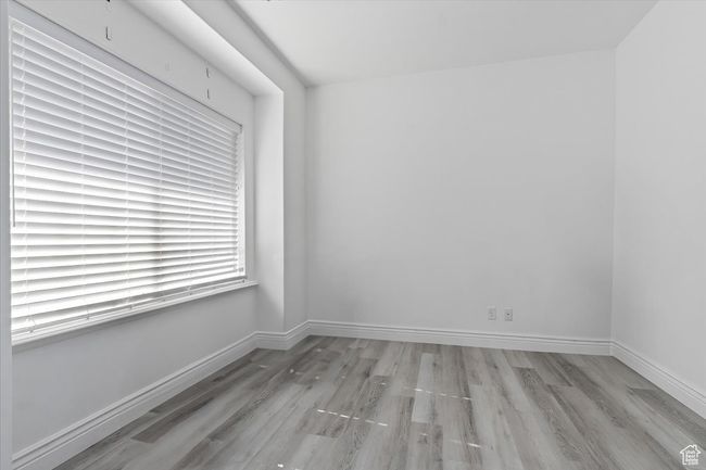 Empty room featuring light hardwood / wood-style flooring | Image 4