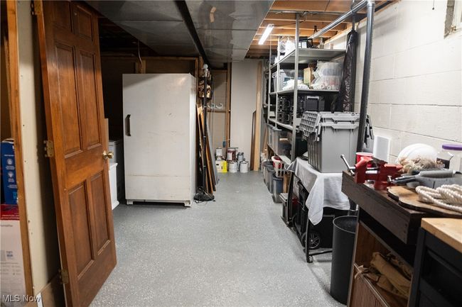Unfinished below grade area with concrete block wall | Image 46