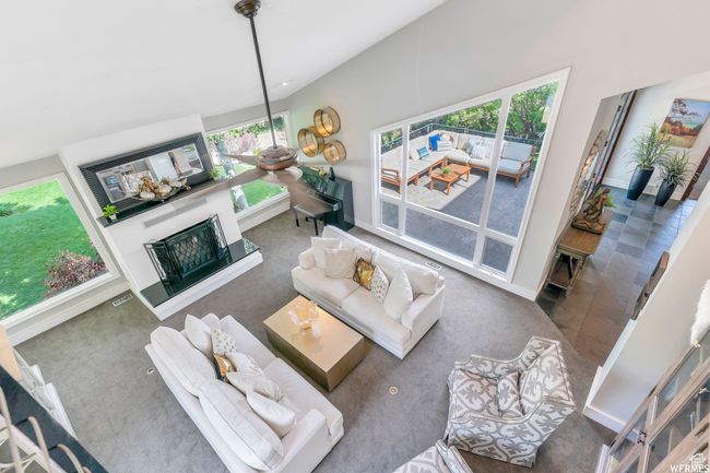 Living room featuring a gas fireplace | Image 18